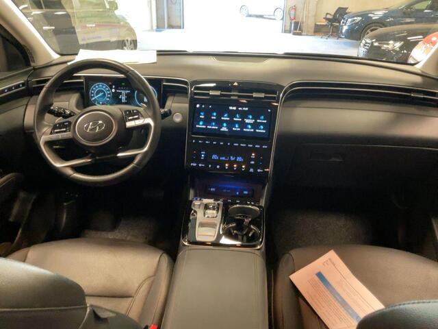 Hyundai TUCSON 1.6 T-GDI PHEV Premium 4WD | Leder | Stoelverwarming/koeling | Navigatie | Camera | Adaptive cruise control