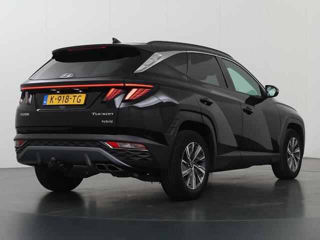 Hyundai TUCSON 1.6 T-GDI HEV Comfort Smart | Trekhaak | Parkeercamera | Stoel/Stuurwielverwarming | Krell Audio | Elektr. Achterklep | Navigatie |