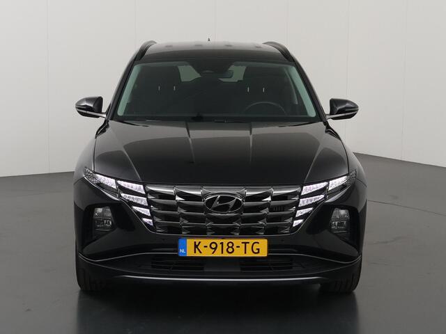 Hyundai TUCSON 1.6 T-GDI HEV Comfort Smart | Trekhaak | Parkeercamera | Stoel/Stuurwielverwarming | Krell Audio | Elektr. Achterklep | Navigatie |