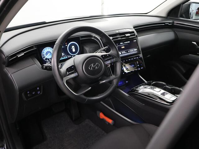 Hyundai TUCSON 1.6 T-GDI HEV Comfort Smart | Trekhaak | Parkeercamera | Stoel/Stuurwielverwarming | Krell Audio | Elektr. Achterklep | Navigatie |