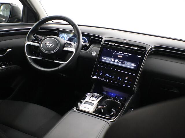 Hyundai TUCSON 1.6 T-GDI HEV Comfort Smart | Trekhaak | Parkeercamera | Stoel/Stuurwielverwarming | Krell Audio | Elektr. Achterklep | Navigatie |