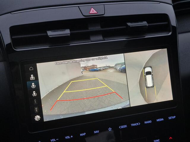 Hyundai TUCSON 1.6 T-GDI PHEV N Line Sky 4WD Automaat / Fabrieksgarantie tot 23-09-2027 / Accu SOH 100% / EAER bereik 62 km bereik stad 74 km / Trekgewicht 1350 kg / Glazen schuif- en kanteldak / Stuur-, Stoel en Achterbank verwarming /