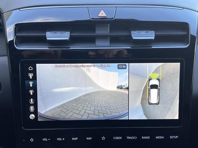 Hyundai TUCSON 1.6 T-GDI HEV 230pk N Line Sky Fabrieksgarantie tot 04-2029 / Dealer onderhouden / 1.650kg Trekgewicht / Panorama schuifdak / Stuur-, stoel- en achterbankverwarming / Apple Carplay Android / 19" LM wielen /