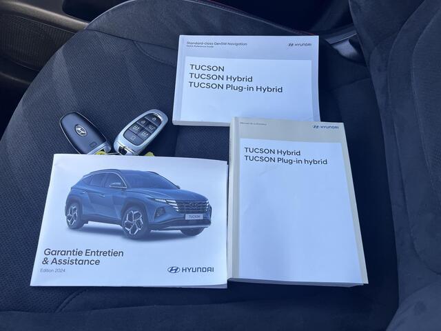 Hyundai TUCSON 1.6 T-GDI HEV 230pk N Line Sky Fabrieksgarantie tot 04-2029 / Dealer onderhouden / 1.650kg Trekgewicht / Panorama schuifdak / Stuur-, stoel- en achterbankverwarming / Apple Carplay Android / 19" LM wielen /