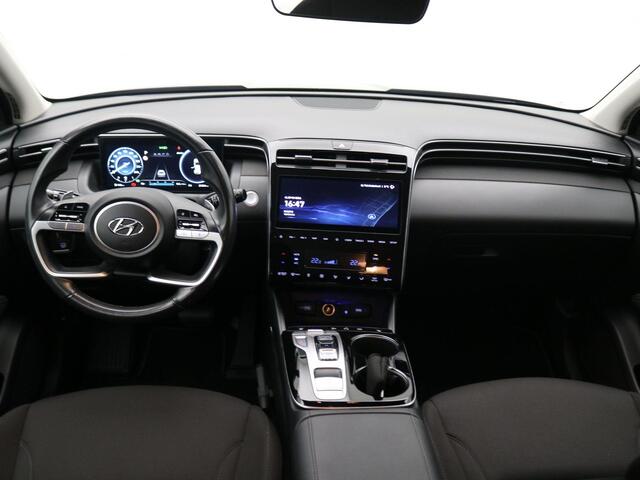 Hyundai TUCSON 1.6 T-GDI HEV Comfort AUTOMAAT / Navigatie / NL Auto / Apple CarPlay & Android Auto / 1650KG Trekgewicht / Achteruitrijcamera / 1ste Eigenaar / Climate control / Adaptieve Cruise control / Stoelverwarming / Dealeronderhouden /
