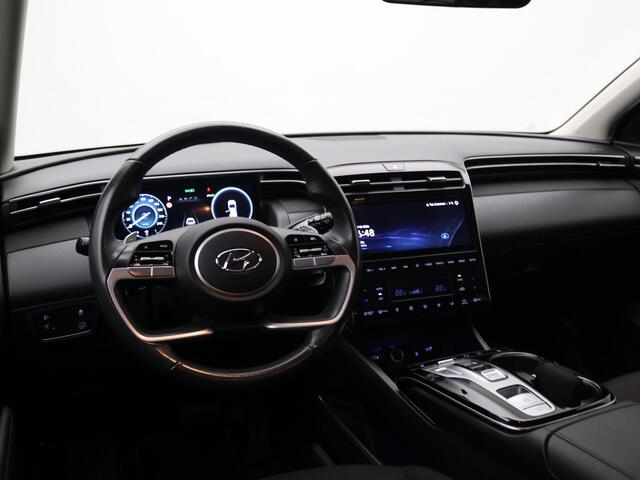 Hyundai TUCSON 1.6 T-GDI HEV Comfort AUTOMAAT / Navigatie / NL Auto / Apple CarPlay & Android Auto / 1650KG Trekgewicht / Achteruitrijcamera / 1ste Eigenaar / Climate control / Adaptieve Cruise control / Stoelverwarming / Dealeronderhouden /