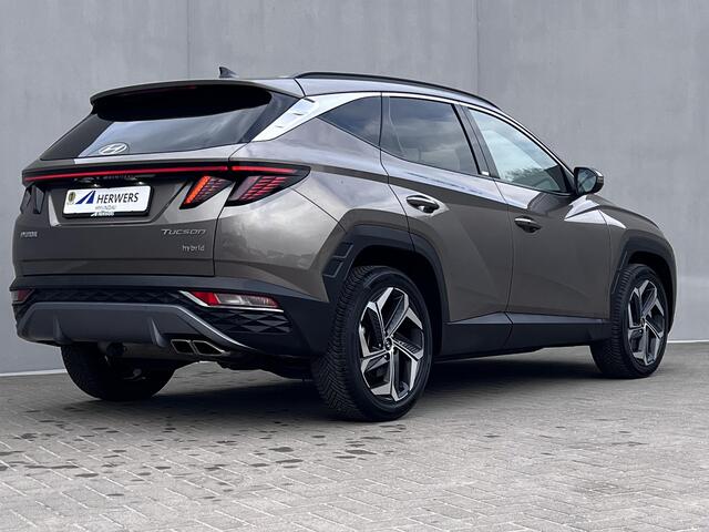 Hyundai TUCSON 1.6 T-GDI HEV Comfort Smart Automaat / Dealer onderhouden / Afneembare trekhaak 1.650 kg / Elektrische klep / Adaptieve CC / Stuur- & stoelverwarming / Navigatie / Camera / Apple Carplay Android / 19" LM + all season banden /