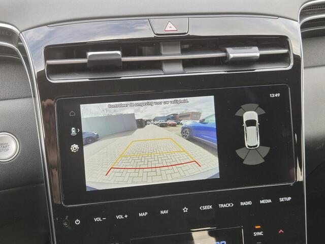 Hyundai TUCSON 1.6 T-GDI PHEV Comfort 4WD Automaat / Dealer onderhouden / Trekhaak 1.350 kg / Navigatie / Trekhaak afneembaar / Camera / Apple Carplay Android / 19" LM + All Season banden / Climate control / Cruise control /
