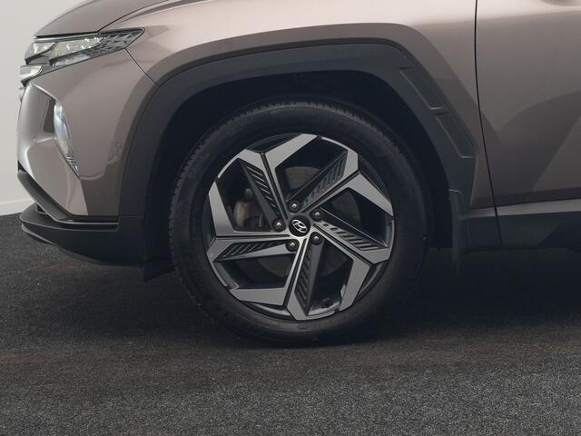 Hyundai TUCSON 1.6 T-GDI Premium 4WD PHEV 265pk Dealer O.H. | Trekhaak Afn. | Adaptive Cruise | 360 Camera | Krell Premium Sound | Lederen Sportstoelen Memory & Ventilatie | Keyless | Apple Carplay | Stoelen & Stuur Verwarmd | Navigatie | DAB | Plug In Hybrid