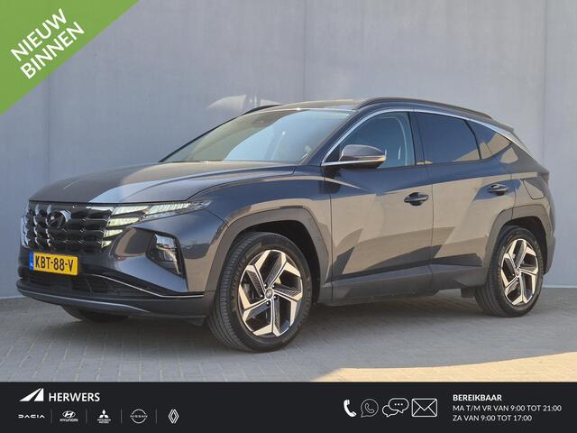 Hyundai TUCSON 1.6 T-GDI PHEV Comfort 4WD Automaat / Accu SOH 100% / Fabrieksgarantie tot 01-2027 / Dealer onderhouden / Trekhaak afneembaar / Adaptieve CC / Trekgewicht 1.350 kg / Camera / Navigatie / Apple Carplay Android / 19" LM wielen / Voorstoelen verwarmd /