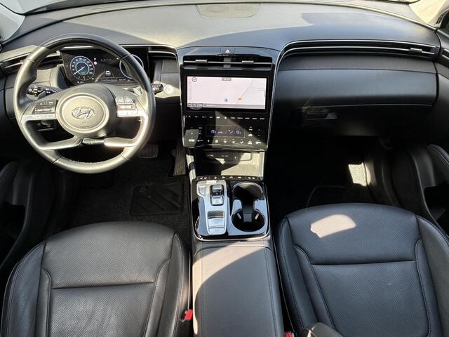 Hyundai TUCSON 1.6 T-GDI HEV 230 Premium Automaat / Dealer onderhouden / Afneembare Trekhaak (1.650KG) / Leder / Elektrische stoelen/klep / Stoelventilatie / Stuur-, stoel- & achterbankverwarming / Apple CarplayAndroid Auto / 19" LM wielen /