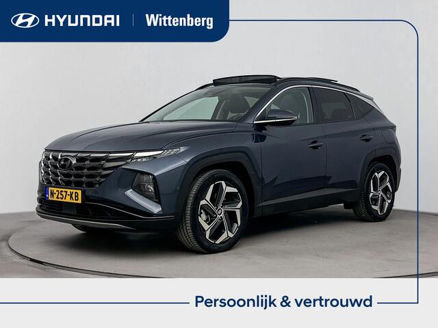 Hyundai TUCSON 1.6 T-GDI HEV Premium Sky | Trekhaak | Schuif/kanteldak | Elektrische stoelen | Navigatie | Dodehoek detectie | Stoel & stuurverwarming | Stoelventilatie |