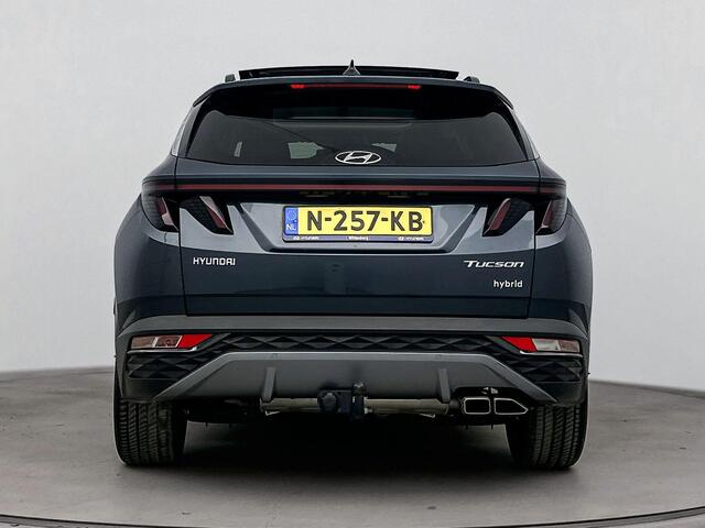 Hyundai TUCSON 1.6 T-GDI HEV Premium Sky | Trekhaak | Schuif/kanteldak | Elektrische stoelen | Navigatie | Dodehoek detectie | Stoel & stuurverwarming | Stoelventilatie |