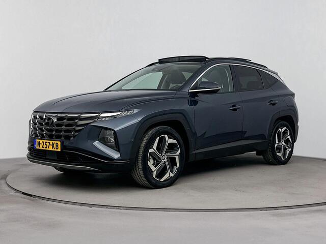 Hyundai TUCSON 1.6 T-GDI HEV Premium Sky | Trekhaak | Schuif/kanteldak | Elektrische stoelen | Navigatie | Dodehoek detectie | Stoel & stuurverwarming | Stoelventilatie |