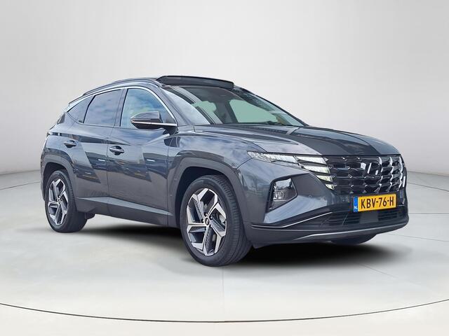 Hyundai TUCSON 1.6 T-GDI HEV Premium Sky | Panoramisch schuif/kantel dak | Apple Carplay/Android Auto | Stoelverwarming/verkoeling | Elektrische achterklep | Elektrische verstelbare stoelen met geheugen |