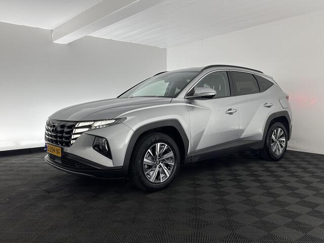 Hyundai TUCSON 1.6 T-GDI HEV Comfort Smart (INCL.BTW) *FULL-LED | ADAPTIVE-CRUISE | HEATED-COMFORTSEATS | KEYLESS | CAMERA | DIGI-COCKPIT | PRIVACY-GLASS | SHIFT-PADDLES | ECC | PDC | 17''ALU*