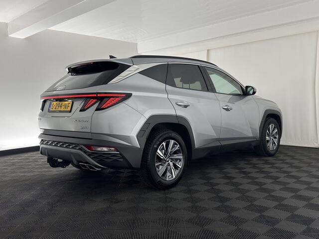 Hyundai TUCSON 1.6 T-GDI HEV Comfort Smart (INCL.BTW) *FULL-LED | ADAPTIVE-CRUISE | HEATED-COMFORTSEATS | KEYLESS | CAMERA | DIGI-COCKPIT | PRIVACY-GLASS | SHIFT-PADDLES | ECC | PDC | 17''ALU*