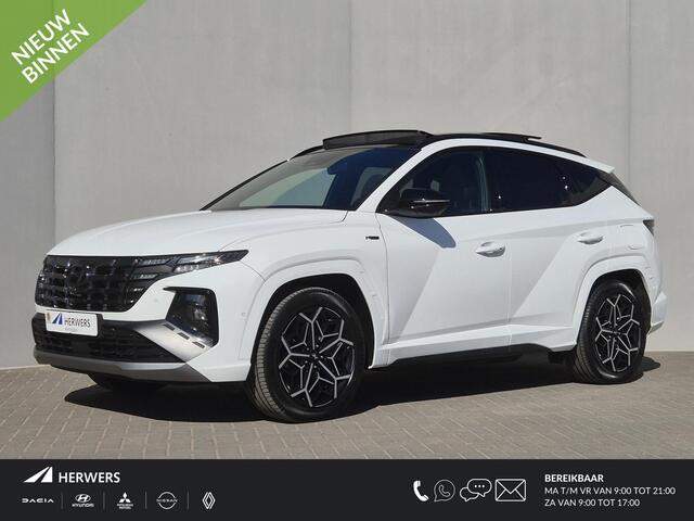 Hyundai TUCSON 1.6 T-GDI PHEV N Line Sky 4WD / Dealer onderhouden / Fabrieksgarantie tot 03-2027 / Trekgewicht 1350 kg / Glazen schuif- en kanteldak / Elektrische achterklep / Stuur- Stoel & Achterbank verwarming / Adaptief cruise control / Rondomzicht camera / Stoelven