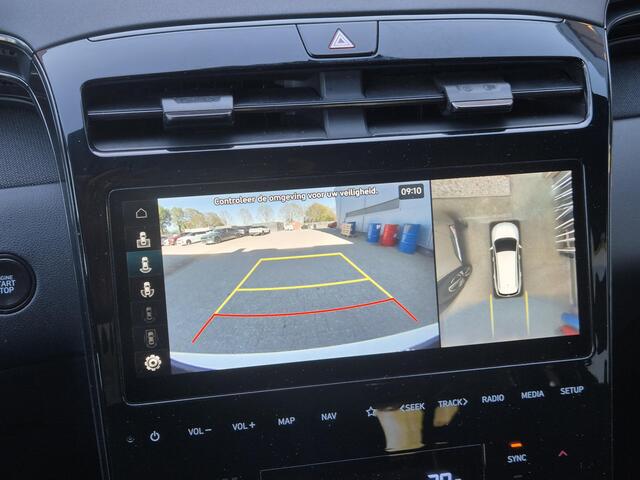 Hyundai TUCSON 1.6 T-GDI PHEV N Line Sky 4WD / Dealer onderhouden / Fabrieksgarantie tot 03-2027 / Trekgewicht 1350 kg / Glazen schuif- en kanteldak / Elektrische achterklep / Stuur- Stoel & Achterbank verwarming / Adaptief cruise control / Rondomzicht camera / Stoelven