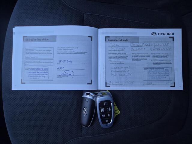 Hyundai TUCSON 1.6 T-GDI PHEV N Line Sky 4WD / Dealer onderhouden / Fabrieksgarantie tot 03-2027 / Trekgewicht 1350 kg / Glazen schuif- en kanteldak / Elektrische achterklep / Stuur- Stoel & Achterbank verwarming / Adaptief cruise control / Rondomzicht camera / Stoelven