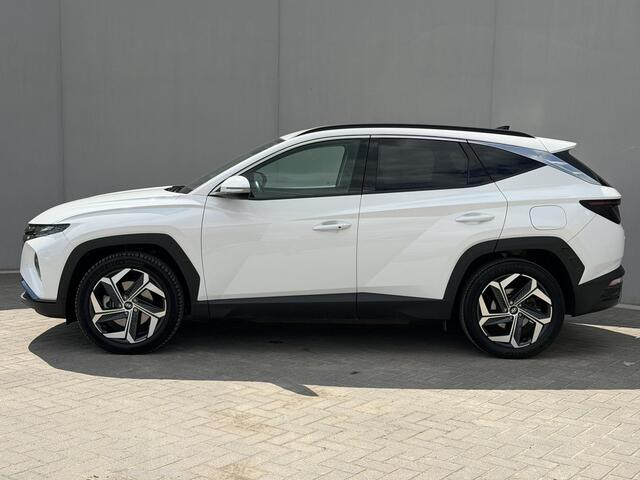 Hyundai TUCSON 1.6 T-GDI PHEV Comfort Smart 4WD / Fabrieksgarantie tot 1-2028 / Volledig Onderhouden / Navigatie / Camera / PDC / DAB / Dodehoek Detectie / All Season Banden / Stoelverwarming /