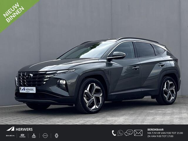 Hyundai TUCSON 1.6 T-GDI PHEV Comfort Smart 4WD / Fabrieksgarantie tot 02-2027 / Afn. trekhaak 1.350 kg / Navigatie / Apple Carplay Android / Camera / Stuur- & stoelverwarming /19" LM wielen /