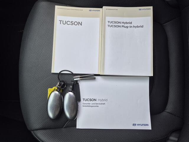 Hyundai TUCSON 1.6 T-GDI PHEV Premium 4WD / Facelift Model / Fabrieksgarantie tot 07-2029 / All season banden / Head Up Display / Trekgewicht 1210 kg / Elektrische achterklep / Stuur- Stoel & Achterbankverwarming / Rondomzicht camera / Stoelventilatie / Apple Carplay An