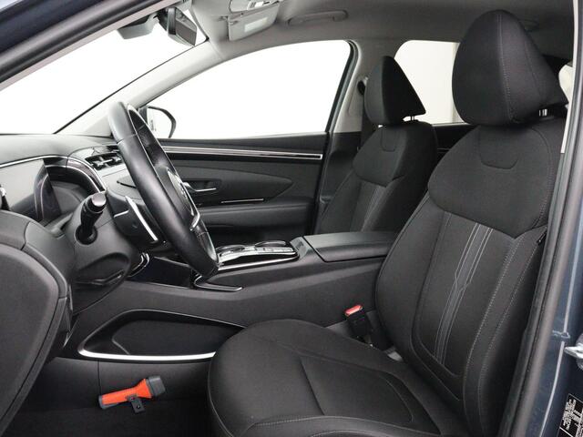 Hyundai TUCSON 1.6 T-GDI HEV Comfort | Trekhaak | Stoelverwarming | Adaptive cruise | Carplay | Camera | Navigatie | Keyless | Full LED | 17'' | Parkeerhulp | Climate control | Digital Cockpit