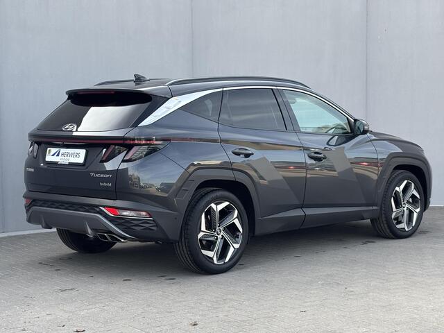 Hyundai TUCSON 1.6 T-GDI HEV 230pk Premium Sky / Dealer onderhouden / Glazen schuif- en kanteldak / Trekgewicht 1650 kg / Elektrische achterklep / Stuur- Stoel & Achterbank verwarming / Rondomzicht camera / Stoelventilatie / Adaptief cruise control / Krell Audio Systeem