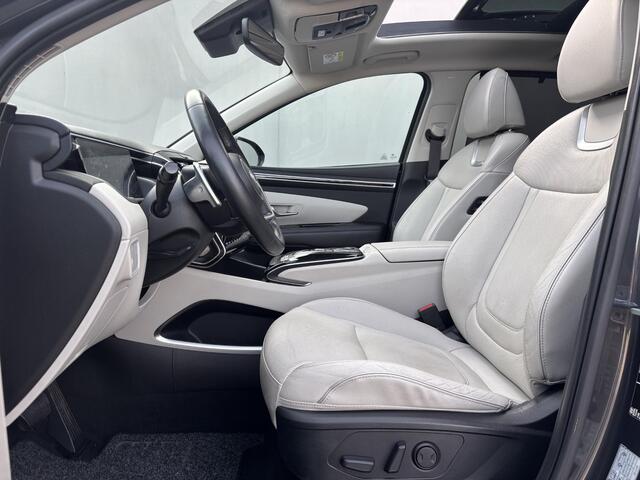 Hyundai TUCSON 1.6 T-GDI HEV 230pk Premium Sky / Dealer onderhouden / Glazen schuif- en kanteldak / Trekgewicht 1650 kg / Elektrische achterklep / Stuur- Stoel & Achterbank verwarming / Rondomzicht camera / Stoelventilatie / Adaptief cruise control / Krell Audio Systeem