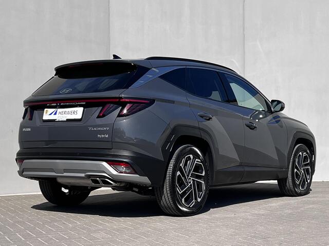 Hyundai TUCSON 1.6 T-GDI HEV 215pk Premium / Nieuw model / Fabrieksgarantie tot 7-2029 / Dealer onderhouden / Navigatie / Stuur- en stoelverwarming / Elektrische klep / Adaptieve CC / 19"LM wielen /