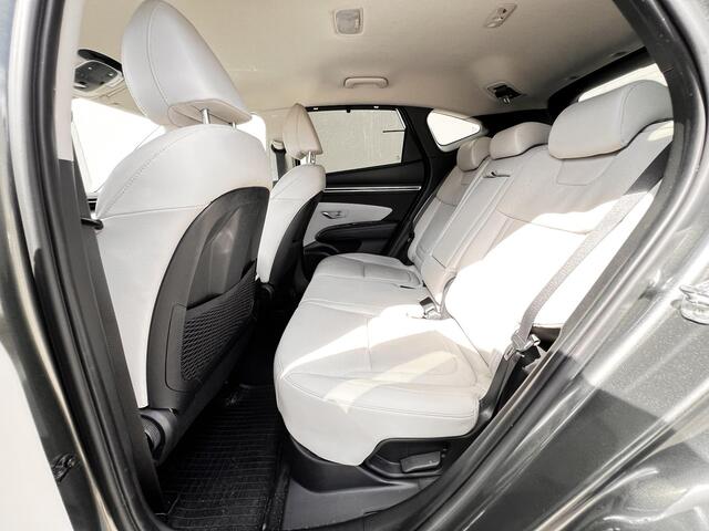 Hyundai TUCSON 1.6 T-GDI HEV AWD Premium Edition / Uniek 4WD / Dealer onderhouden / 1.650 kg trekgewicht / Leder / Elektrische klep / Stoelventilatie / Stuur-, stoel- & achterbankverwarming / 19" LM wielen & All Season banden /