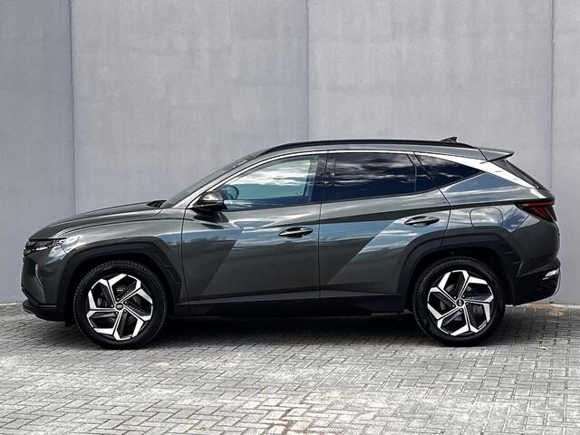 Hyundai TUCSON 1.6 T-GDI HEV AWD Premium Edition / Uniek 4WD / Dealer onderhouden / 1.650 kg trekgewicht / Leder / Elektrische klep / Stoelventilatie / Stuur-, stoel- & achterbankverwarming / 19" LM wielen & All Season banden /