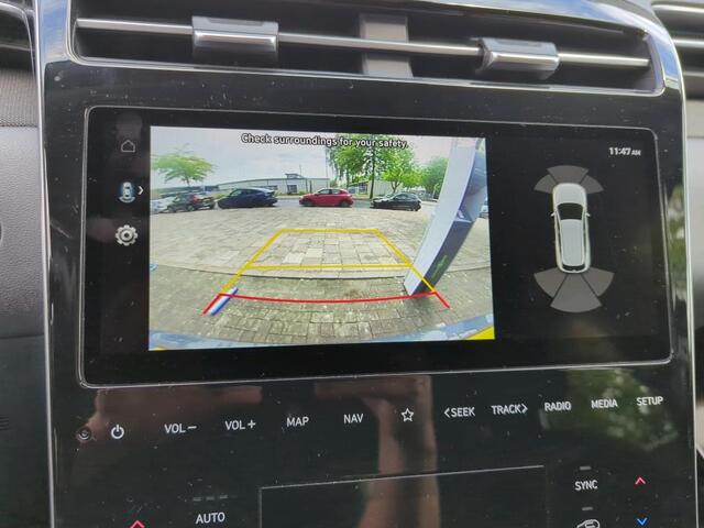 Hyundai TUCSON 1.6 T-GDI HEV Comfort Smart | Trekhaak | Camera | Navigatie | Stoel/Stuurverw.