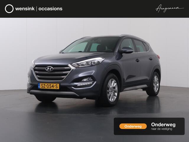 Hyundai TUCSON 1.6 T-GDi Comfort | 1900kg Trekkracht | Navigatie | Climate Control | Stoelverwarming voor + achter | Camera | Trekhaak | DAB |
