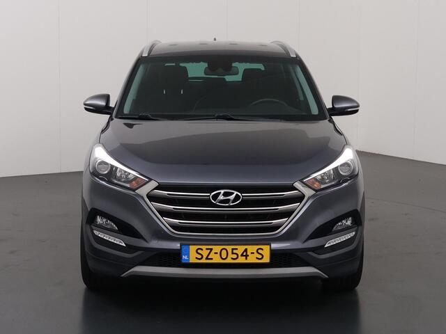 Hyundai TUCSON 1.6 T-GDi Comfort | 1900kg Trekkracht | Navigatie | Climate Control | Stoelverwarming voor + achter | Camera | Trekhaak | DAB |