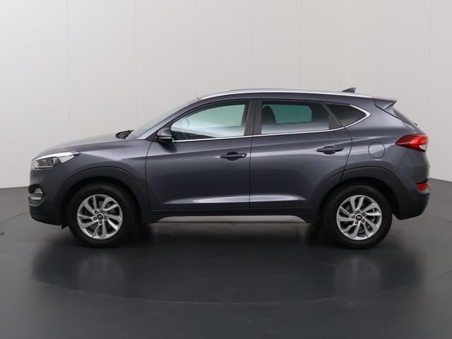 Hyundai TUCSON 1.6 T-GDi Comfort | 1900kg Trekkracht | Navigatie | Climate Control | Stoelverwarming voor + achter | Camera | Trekhaak | DAB |