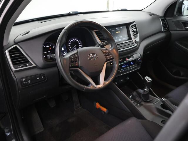 Hyundai TUCSON 1.6 T-GDi Comfort | 1900kg Trekkracht | Navigatie | Climate Control | Stoelverwarming voor + achter | Camera | Trekhaak | DAB |
