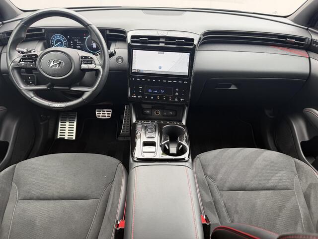 Hyundai TUCSON 1.6 T-GDI PHEV N Line Sky 4WD / Dealer onderhouden / Panorama schuifdak / Fabrieksgarantie tot 11-2027 / Elektrische klep & stoelen / Navigatie / Apple Carplay Android / Stoelventilatie / Adaptieve Cruise / Stuur-, stoel- & achterbankverwarming /