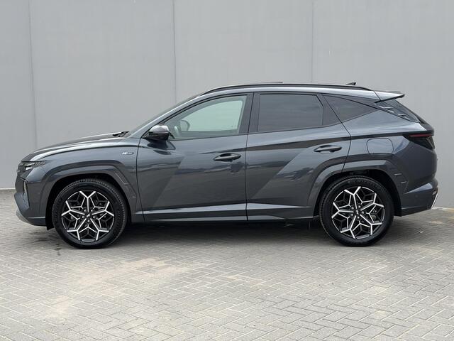 Hyundai TUCSON 1.6 T-GDI PHEV N Line Sky 4WD / Dealer onderhouden / Panorama schuifdak / Fabrieksgarantie tot 11-2027 / Elektrische klep & stoelen / Navigatie / Apple Carplay Android / Stoelventilatie / Adaptieve Cruise / Stuur-, stoel- & achterbankverwarming /