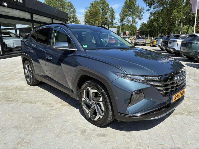 Hyundai TUCSON 1.6 T-GDI PHEV Premium Sky 4WD Automaat | ECC | Navigatie | Camera | Winterpakket | Panorama dak | Leder | Trekhaak | Zeer Kompleet
