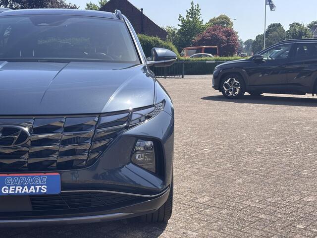 Hyundai TUCSON 1.6 T-GDI PHEV Premium 4WD l Panoramadak, Stoelverwarming, Adaptieve Cruise control, Camera, Elektr. kofferklep, Keyless, Apple Carplay/Android Auto.