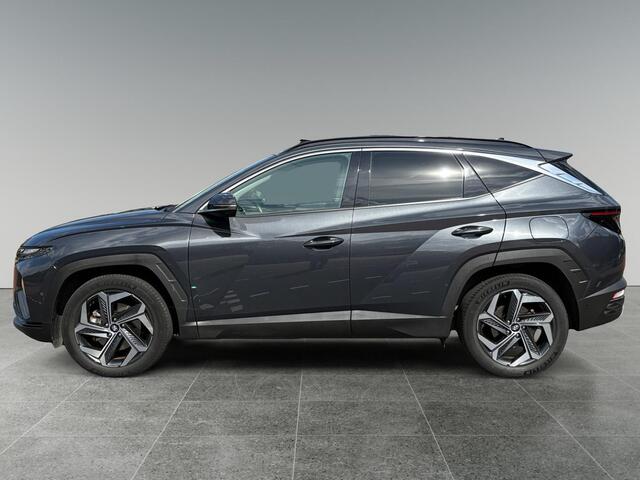 Hyundai TUCSON 1.6 T-GDI 230pk HEV Premium Sky | SCHUIF/KANTELDAK | LEDEREN BEKLEDING | STOELVENTILATIE & VERWARMING | BLIND SPOT CAMERA | LAGE KMSTAND |