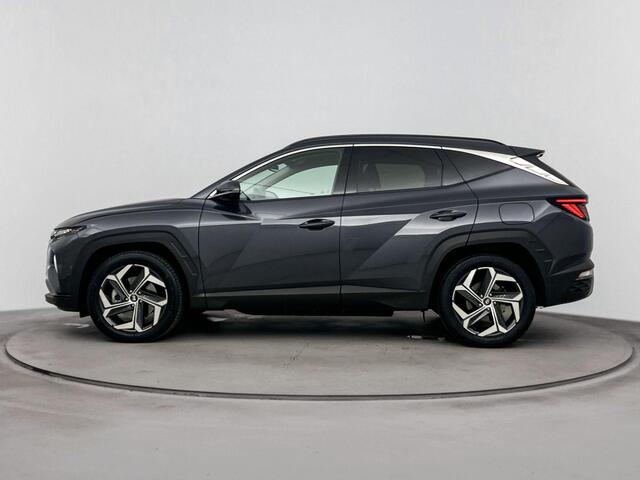 Hyundai TUCSON 1.6 T-GDI PHEV Premium 4WD | Lederen bekleding | Stoel/Stuurverwarming | Metallic lak |