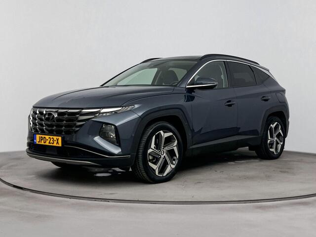 Hyundai TUCSON 1.6 T-GDI PHEV Premium Sky 4WD | Schuif kanteldak | Stoelverwarming & verkoeling | Stuurverwarming | Achteruitrij camera | Navigatie | Dodehoek detectie |