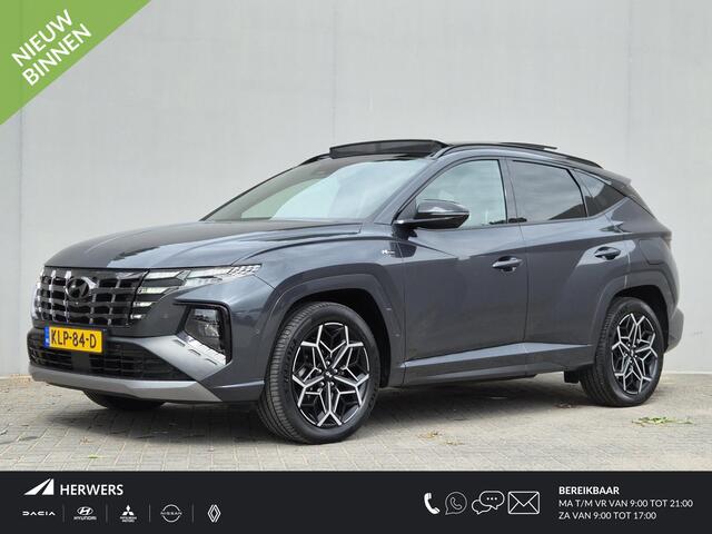 Hyundai TUCSON 1.6 T-GDI HEV N Line / Trekgewicht 1650 kg / Elektrische achterklep / Glazen schuif- en kanteldak / Stuur- Stoel & Achterbank verwarming / Rondomzicht camera / Adaptief cruise control / Keyless Entry/Start / Apple Carplay Android Auto /