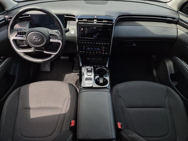 Hyundai TUCSON 1.6 T-GDI PHEV Comfort Smart Sky 4WD / Fabrieksgarantie tot 02-2029 / Dealer onderhouden / Glazen schuif- en kanteldak / Stuur- & Stoelverwarming / Trekgewicht 1350 kg / Achteruitrijcamera / Apple Carplay Android Auto / Adaptief cruise control /