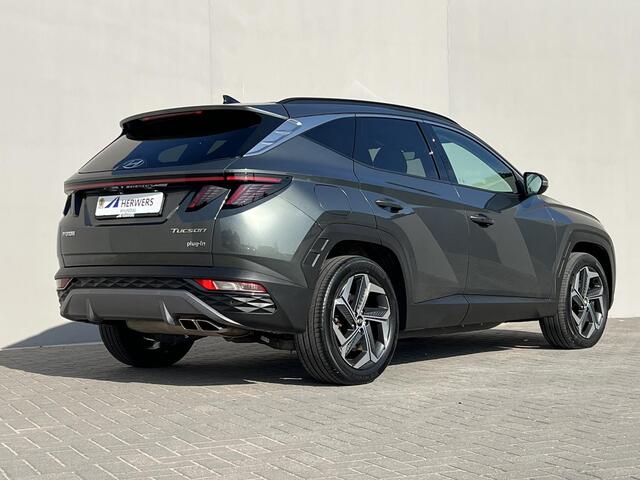 Hyundai TUCSON 1.6 T-GDI PHEV Comfort Smart 4WD / 99% SOH / Fabrieksgarantie tot 04-2027 / WLTP 62km / Navi / Apple Carplay Android / Stuur- en stoelverwarming / Adapt. CC / 19" LM wielen /