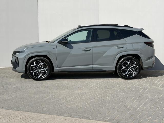 Hyundai TUCSON 1.6 T-GDI HEV N Line Sky / Elektrische achterklep / Adaptieve cruise control / Elektrisch schuif-kanteldak / Trekhaak (1650 KG) / Stoelverwarming voor en achter / Stoelventilatie /