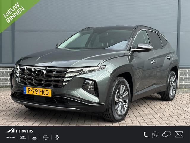 Hyundai TUCSON 1.6 T-GDI HEV Comfort Smart / Afneembare Trekhaak / 1650 kg Trekgewicht / Stoel en Stuurverwarming / Navigatiesysteem / Apple Carplay / Android Auto / Adaptieve Cruise Control / Achteruitrijcamera /